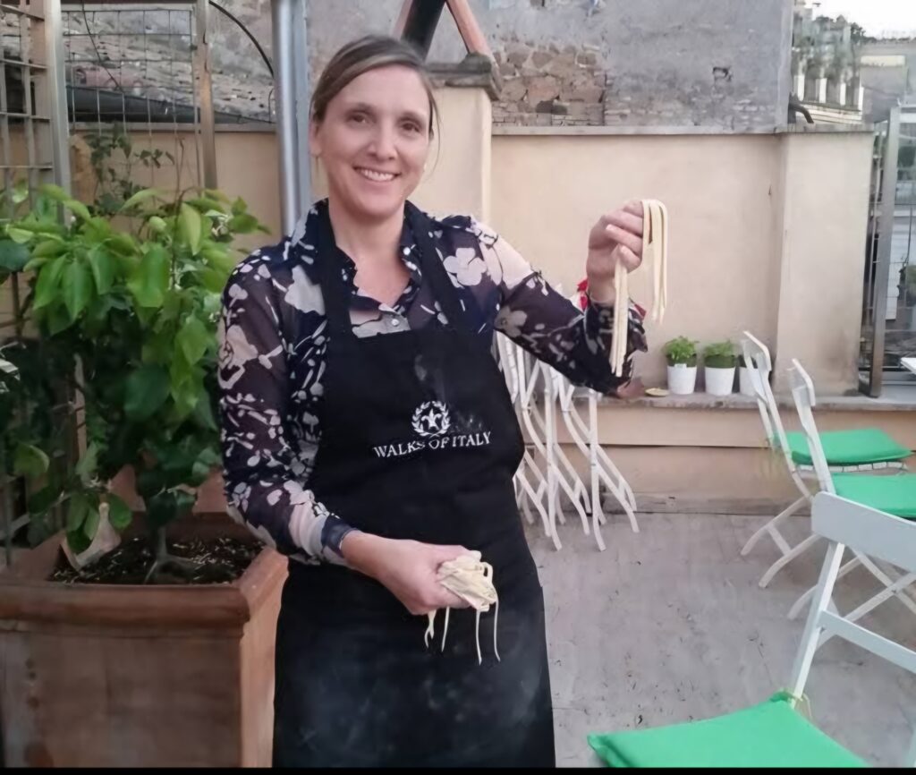 Kellie from Bloom with Kellie making pasta at a cooking class in Rome